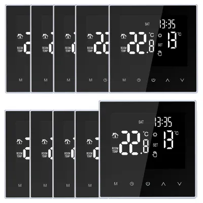 A collection of digital thermostats arranged in two rows.