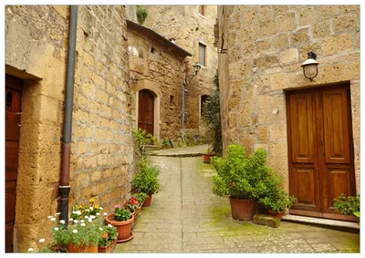 Produktbild von Wallario Premium Glasbild, freischwebende Optik, kräftige Farben, Größe 100 x 70 cm Motiv Weg durch die Altstadt - Toskana in Italien