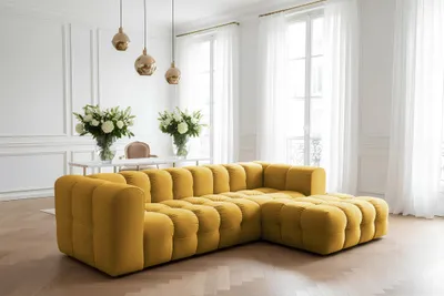 Productafbeelding van Designbank SOLVIE, model hoekbank, bekleed met stof Tiffani in de kleur honinggeel, met een hocker aan de rechterkant