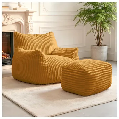 Produktbild von Gebogener Loungesessel mit passendem Hocker, ideal für eine elegante Gestaltung