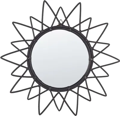 A black rattan sunburst mirror is shown against a white background.