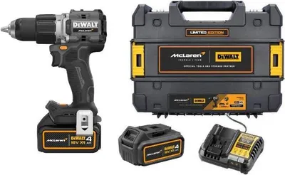 A Dewalt cordless drill kit with a case, battery, and charger, presented on a white background.