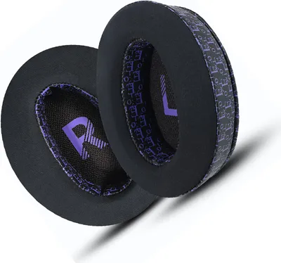 Two ear pads for headphones, one slightly overlapping the other, shown from a diagonal angle against a white background.