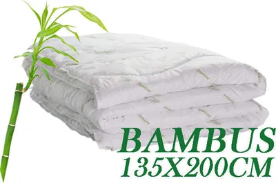A folded white duvet with a bamboo stalk on the left, and text overlay indicating the product name and size.