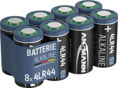 A pack of 8 ANSMANN 4LR44 6V alkaline batteries is presented in a blue plastic holder against a white background.