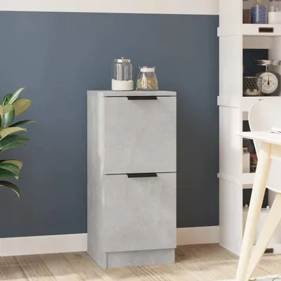 A gray sideboard with two drawers is shown against a dark blue wall and a white shelving unit.