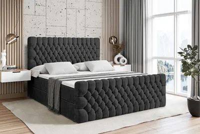 A bedroom setting with a bed.