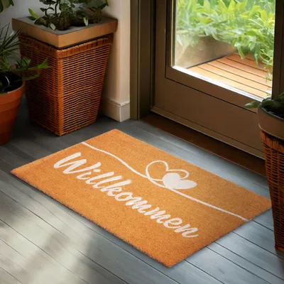 Produktbild von BRUBAKER Fußmatte Willkommen mit Herzen - 45x75 cm Kokos Schmutzfangmatte - Wetterfest & Rutschfest - Braun