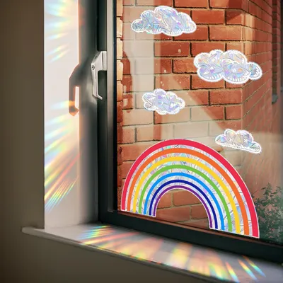Produktbild von Fensteraufkleber mit Regenbogen und weißen Wolken für Vogelschutz