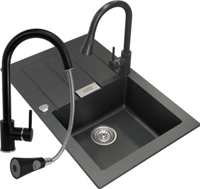 A black granite composite kitchen sink with two black faucets, one with a pull-down sprayer.
