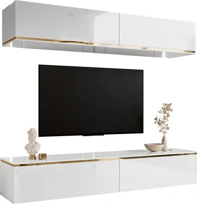 A modern white high-gloss wall-mounted entertainment center with a television and decorative items.