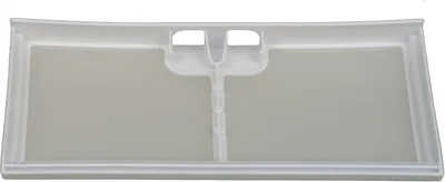 A white plastic filter for a washing machine or dryer.