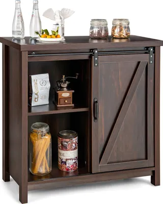 A dark brown wooden sideboard buffet with a sliding barn door, displaying various kitchen items on its shelves and top surface.