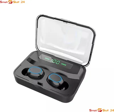 A pair of black wireless earbuds in their charging case with a transparent lid.