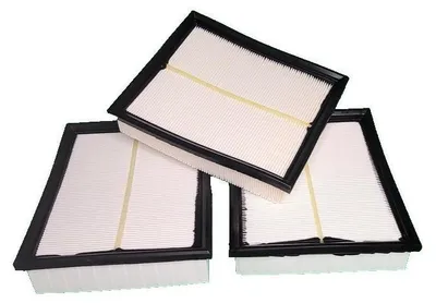 Three air filters are stacked on top of each other against a white background.