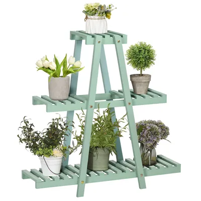 A light green, three-tiered plant stand filled with various potted plants.