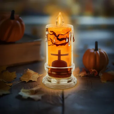 Productafbeelding van Halloween LED-kaars - grafsteenmodel - oranje LED - 3 x LR1130 batterijen - 5 x 5 x 10 cm, AI-gegenereerde afbeelding