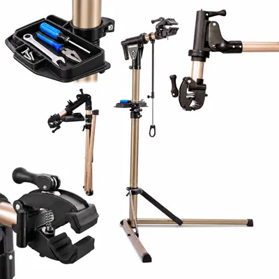 Productafbeelding van Relaxdays fietsenstandaard, in hoogte verstelbaar van 100-160 cm, geschikt voor frames van 35-85 mm, met stuurhouder, belastbaar tot 50 kg, goudkleurig, AI-gegenereerde afbeelding