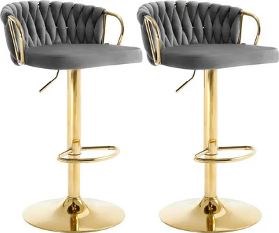 Two dark gray bar stools with gold legs and footrests are shown against a white background.