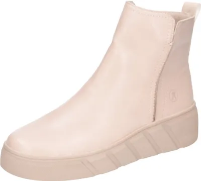 A single beige boot is shown against a white background.