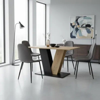 A dining set with a table and chairs in a modern dining room.