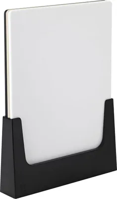 A white cutting board in a black stand.