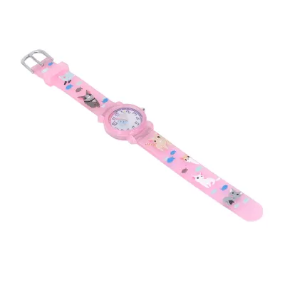 A pink children's watch with cartoon cat illustrations on the strap and a cartoon face on the dial.