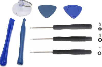A collection of electronic repair tools laid out on a white background.