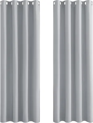 Two light gray curtains hanging vertically against a white background.