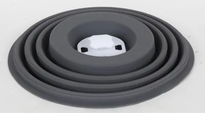 A gray silicone collapsible lid with a white plastic center piece is shown.