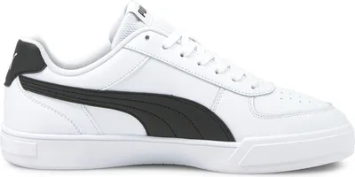A white Puma Caven sneaker with black accents is shown against a white background.