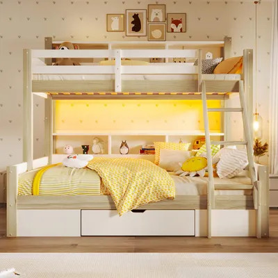 A bunk bed in a child's bedroom with decorative wall art and lighting.
