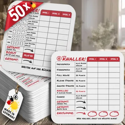 A stack of game scorepads with a close-up of one pad showing game details and scoring.