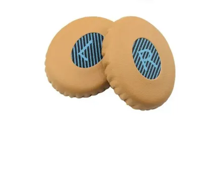Two ear pads for headphones on a white background.