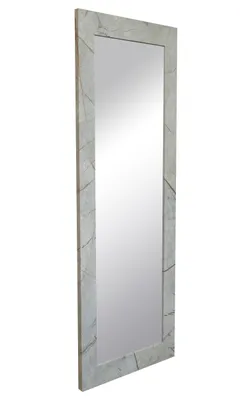 A full-length mirror with a decorative frame.
