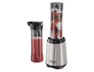 A Russell Hobbs stand mixer with two attachments, one filled with fruit and ice, and the other with a red smoothie.