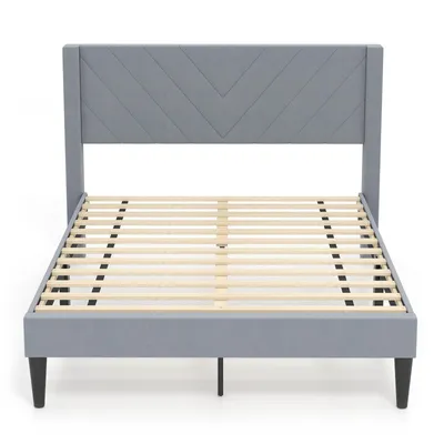 A grey upholstered bed frame with a wooden slat mattress support is shown against a white background.