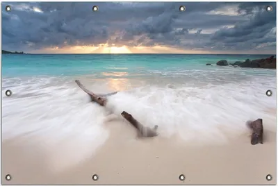 Produktbild von Wallario Outdoor-Poster für Garten oder Balkon, Motiv Wellen am Strand bei Sonnenuntergang, in ca. 80 x 120 cm