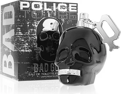 A black skull-shaped perfume bottle and its packaging are displayed on a white background.