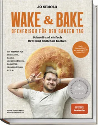 A cookbook cover featuring a man and a large bagel.