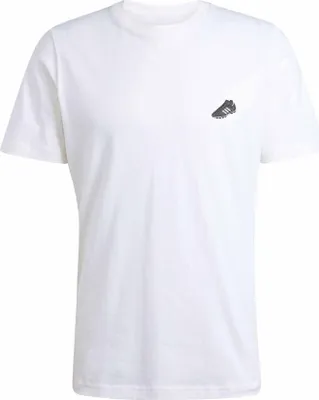 A white t-shirt with a small black graphic of a soccer cleat on the left chest.