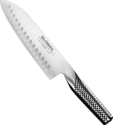 A professional studio shot of a Global Santoku knife with a dimpled blade and a dotted handle, set against a white background.