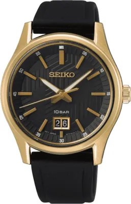 A close-up studio shot of a gold Seiko watch with a black dial and black strap.