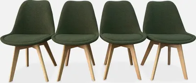 Four green chairs with wooden legs are arranged in a row against a light gray background.