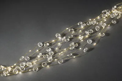 Produktbild von Konstsmide - LED Diamantenlametta 26 Stränge à 27 Dioden , 702 warm weiße Dioden, 12V Innentrafo, goldfarbener Draht; 6393-180