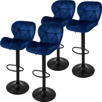 Four blue velvet bar stools with black bases are arranged in a group against a white background.