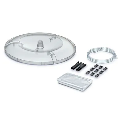 A collection of parts for a gardening product, including a clear plastic base, black clips, and a coiled tube.