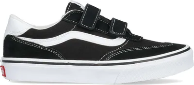 A black and white Vans sneaker is shown from the side against a white background.