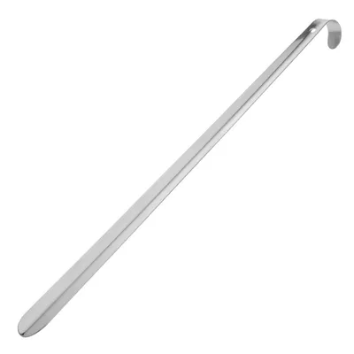 A long, thin, metallic shoehorn is shown against a white background.