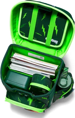 An open school backpack with its contents displayed.